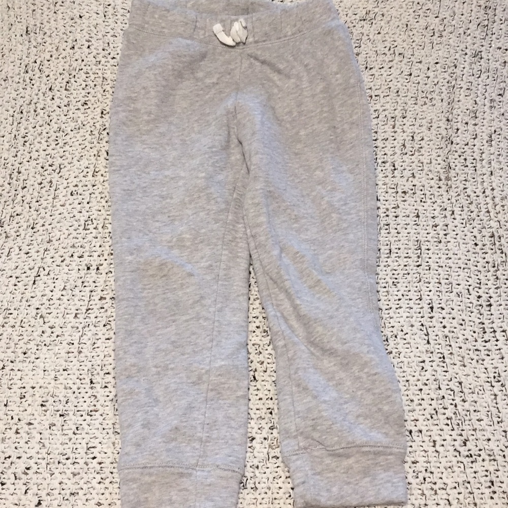 Girls size 4T sweat pants, small stain on back.